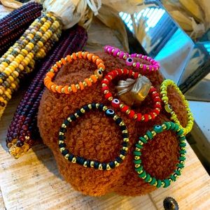 Custom Made Evil Eye  Bracelets! Made with Heishi beads and gold plastic beads.